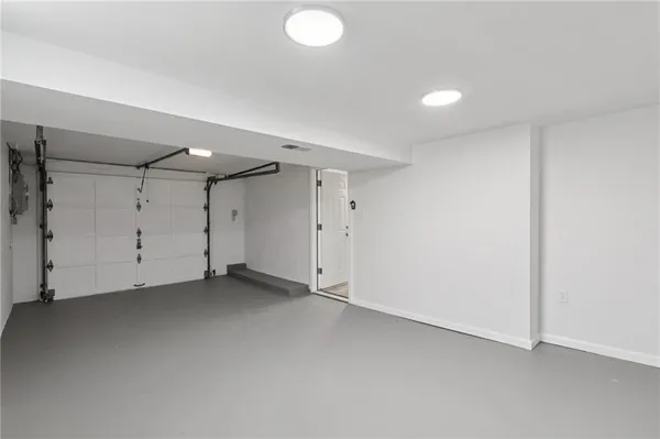 a view of a balcony with yard