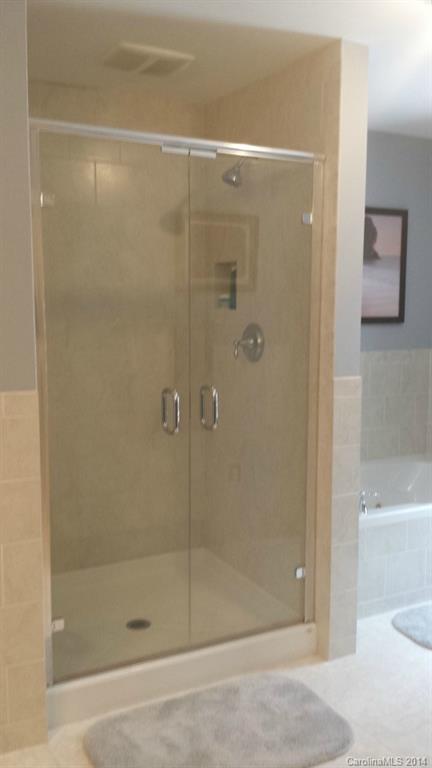 5465 Deer Run Court Davidson, NC 28036 - Photo 11 of 15 a bathroom with a shower