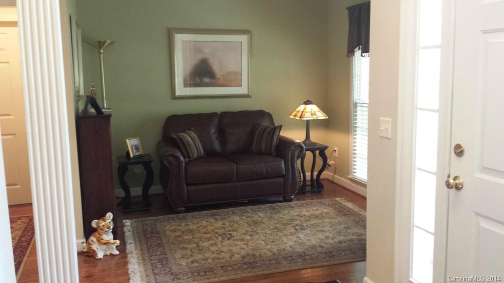 5465 Deer Run Court Davidson, NC 28036 - Photo 7 of 15 a living room with furniture and a rug