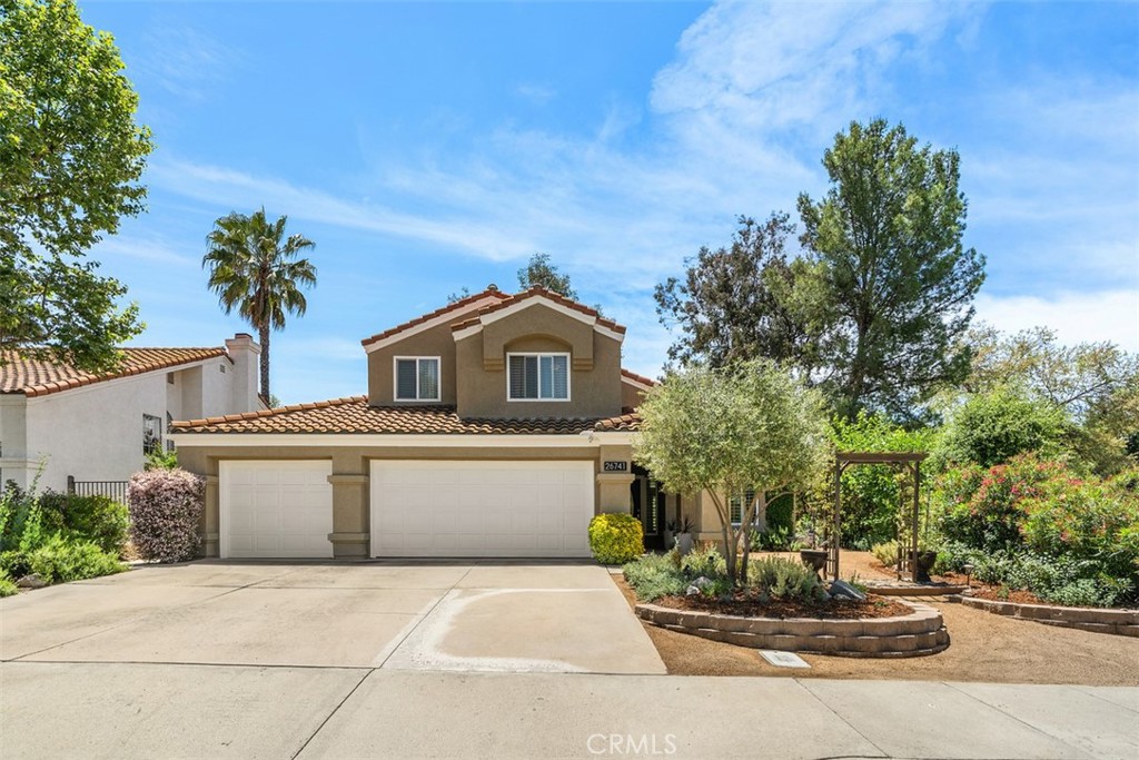 26741 Contignac Drive Murrieta, CA 92562 - Photo 1 of 1 a front view of a house with a yard