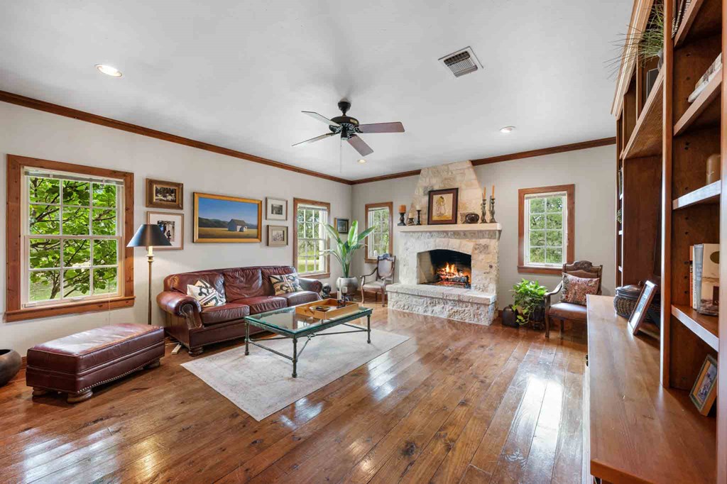 6754 North Grape Creek Road Fredericksburg, TX 78624 - Photo 13 of 47 a living room with furniture fireplace and window