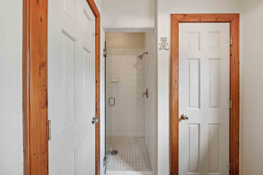 6754 North Grape Creek Road Fredericksburg, TX 78624 - Photo 18 of 47 a view of a bathroom from a hallway