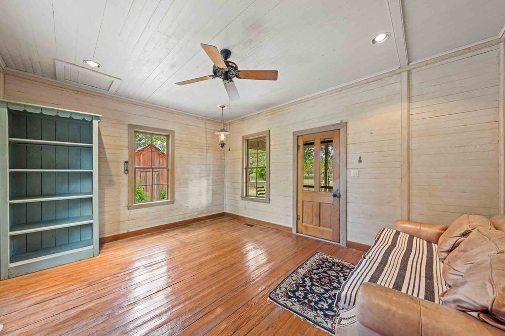 6754 North Grape Creek Road Fredericksburg, TX 78624 - Photo 20 of 47 a view of livingroom with furniture and wooden floor