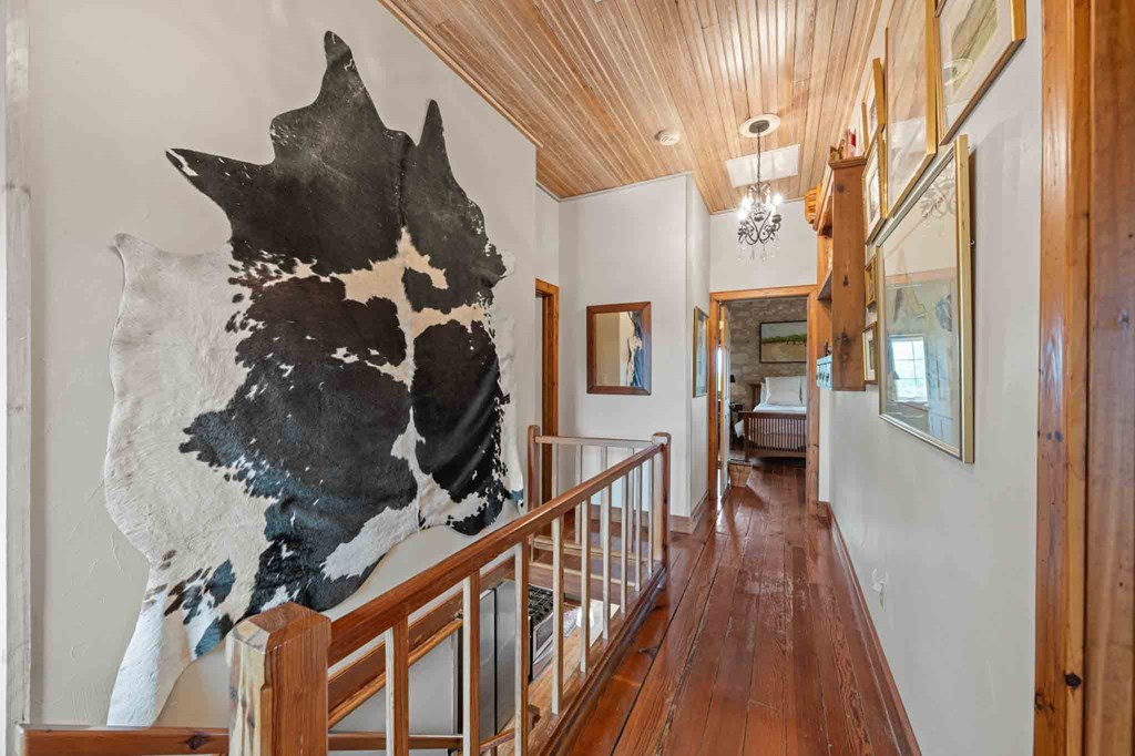 6754 North Grape Creek Road Fredericksburg, TX 78624 - Photo 23 of 47 a view of entryway with wooden floor