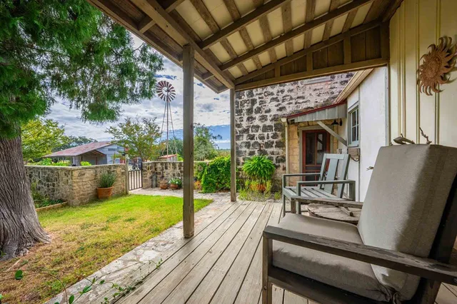 a view of a backyard with garden