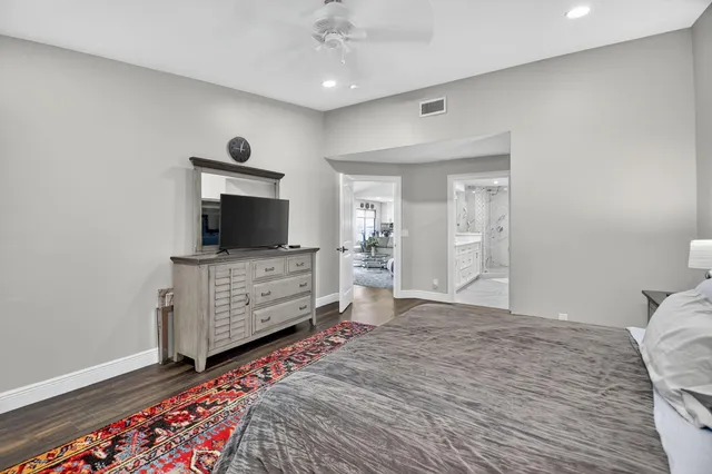 a bathroom with a double vanity sink mirror double and shower