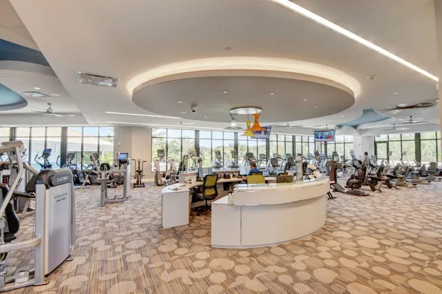 a view of a lake with couches and ocean view
