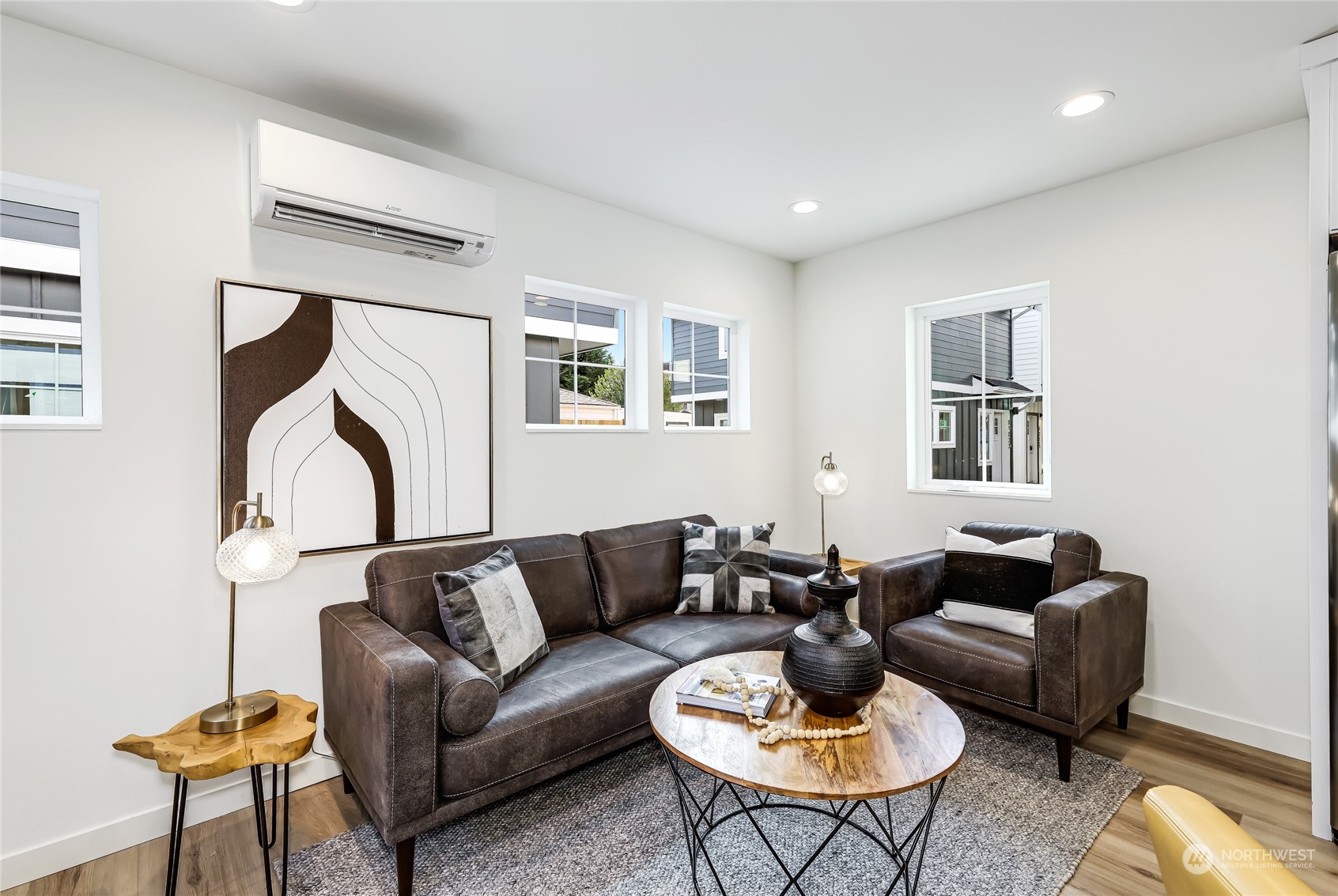 9033 15th Avenue Southwest Seattle, WA 98106 - Photo 7 of 17 a living room with furniture a rug and a window