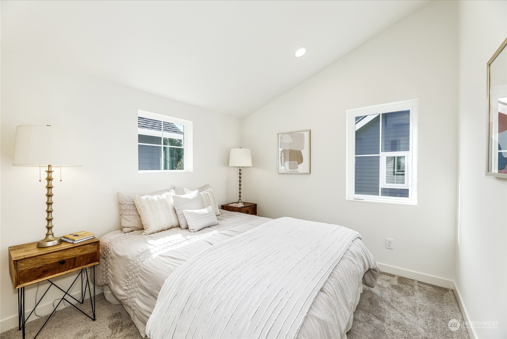 9033 15th Avenue Southwest Seattle, WA 98106 - Photo 9 of 17 a bedroom with a bed and wooden floor