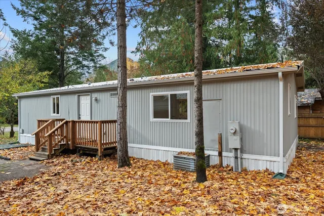 a house with trees in the background