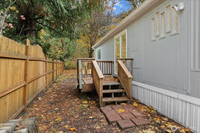a view of a balcony with wooden floor