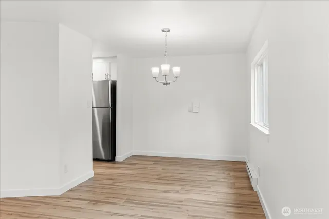 a view of a livingroom with wooden floor
