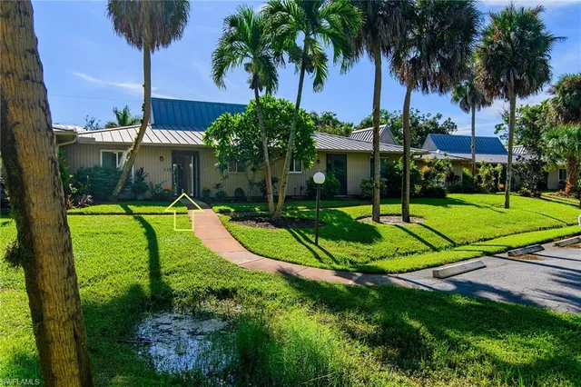 a view of a swimming pool with a garden
