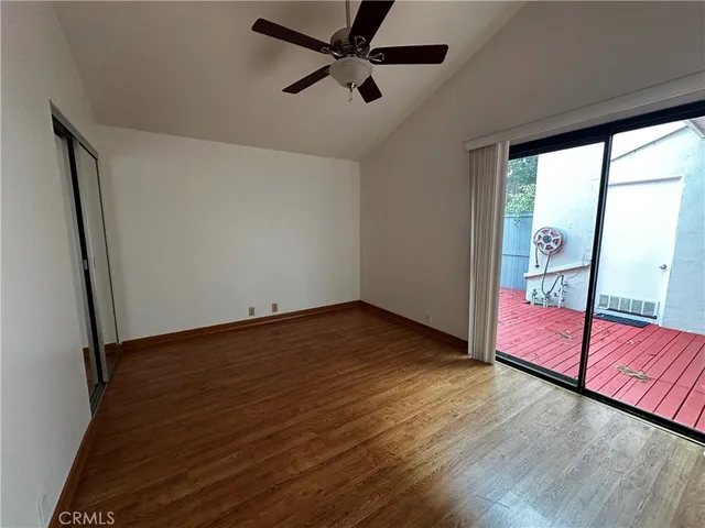 a bathroom with a shower and toilet