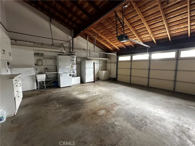 a view of a table and chairs in the garden