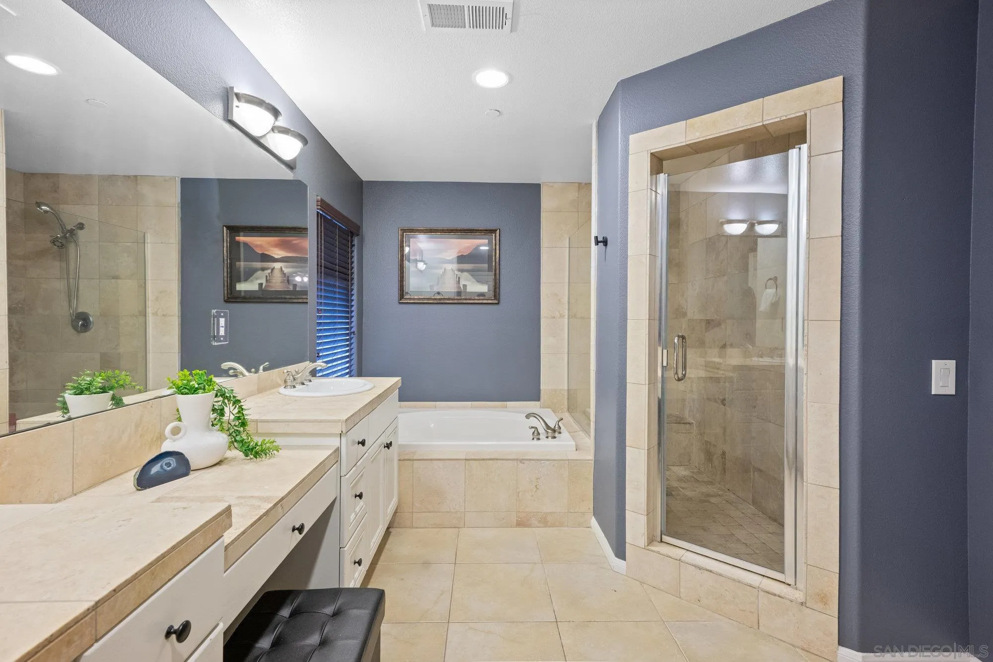 640 Dimaio Way Escondido, CA 92027 - Photo 17 of 31 a spacious bathroom with a tub shower and sink