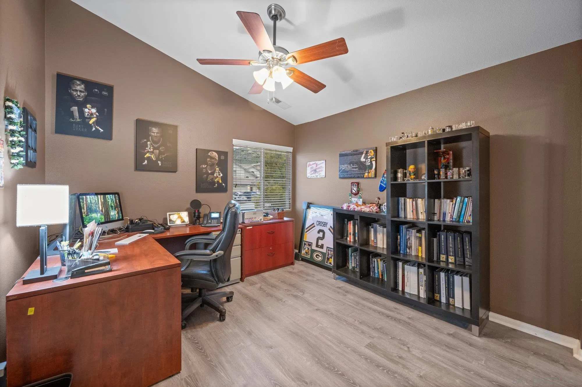 640 Dimaio Way Escondido, CA 92027 - Photo 21 of 31 a view of a workspace with furniture and a bookshelf