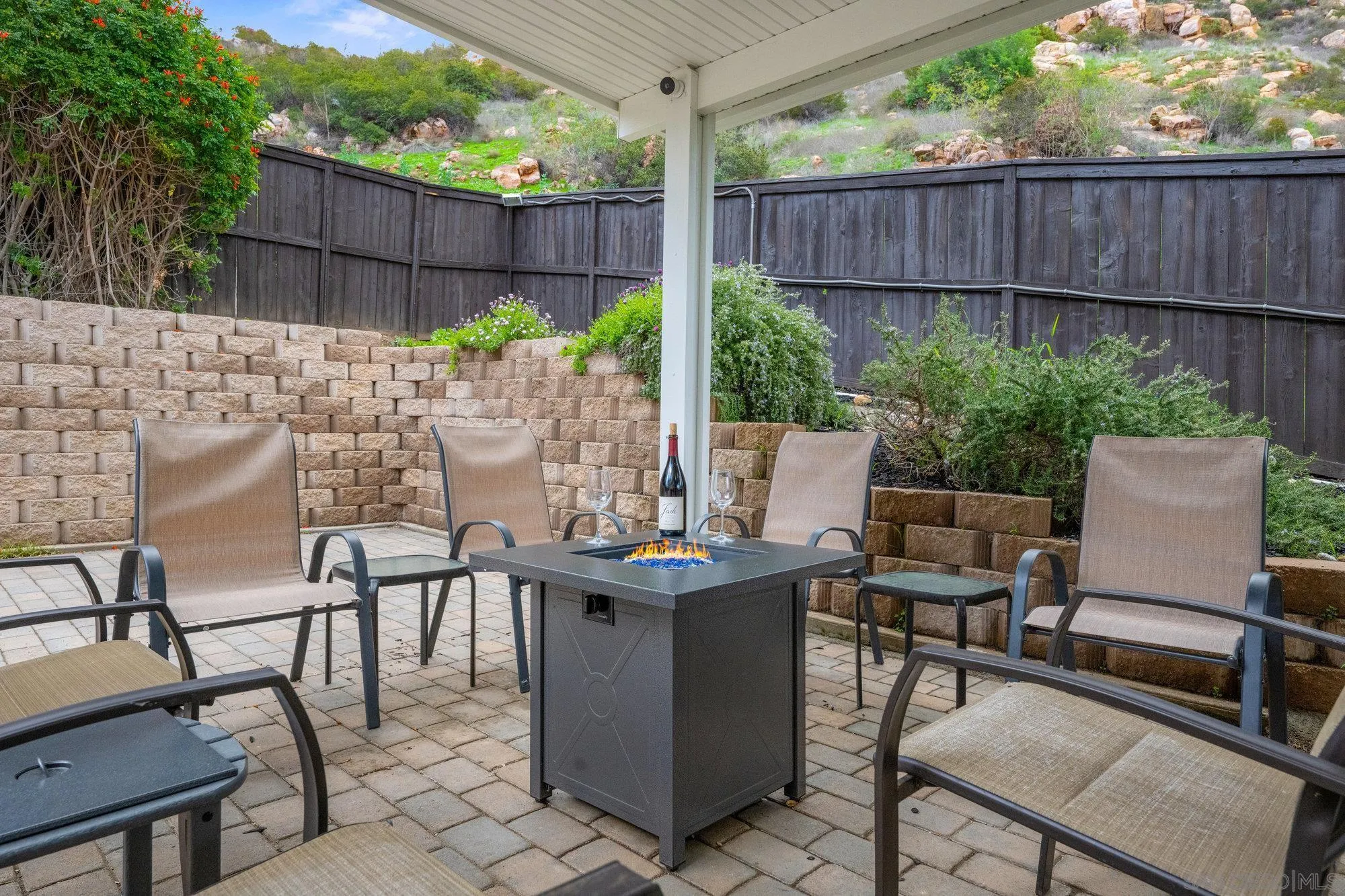 640 Dimaio Way Escondido, CA 92027 - Photo 22 of 31 a view of a backyard with furniture and a garden