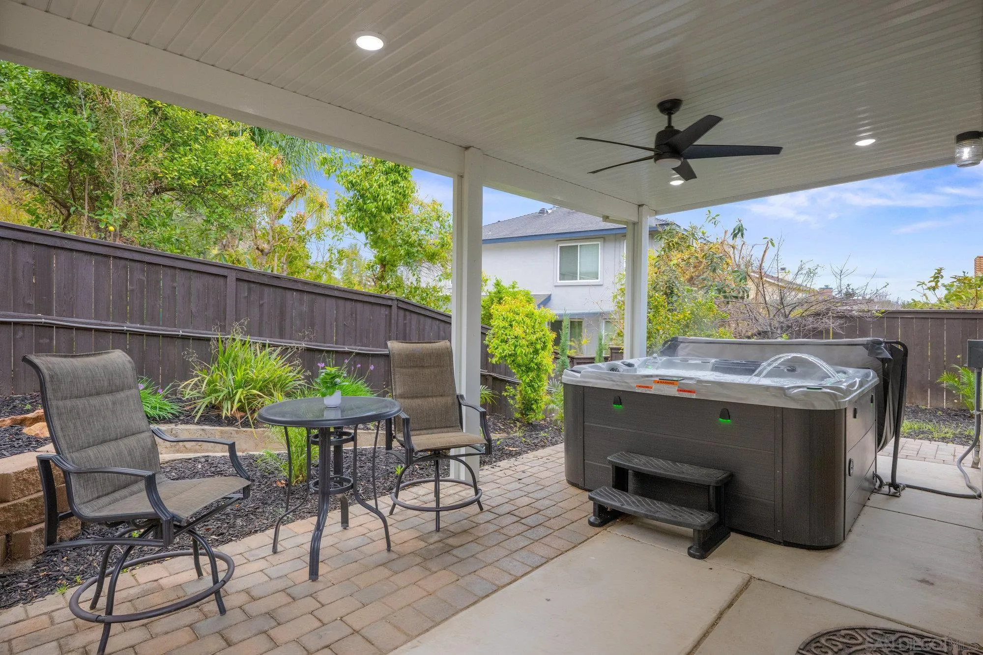 640 Dimaio Way Escondido, CA 92027 - Photo 23 of 31 a view of a patio with table and chairs