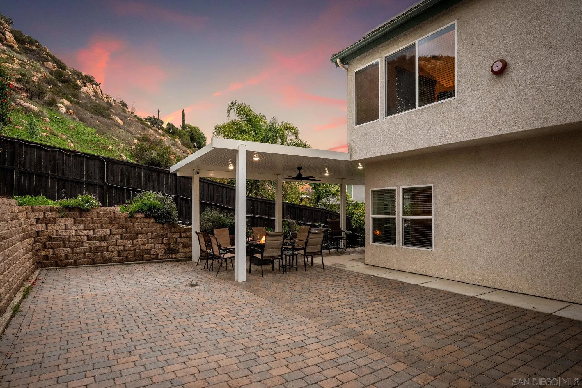 640 Dimaio Way Escondido, CA 92027 - Photo 24 of 31 a backyard of a house with yard and outdoor seating