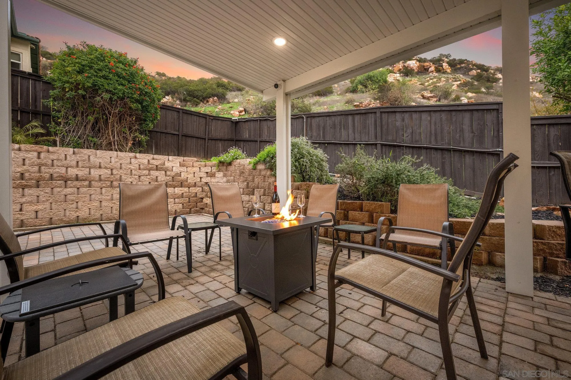 640 Dimaio Way Escondido, CA 92027 - Photo 27 of 31 a view of an outdoor sitting area with wooden walls