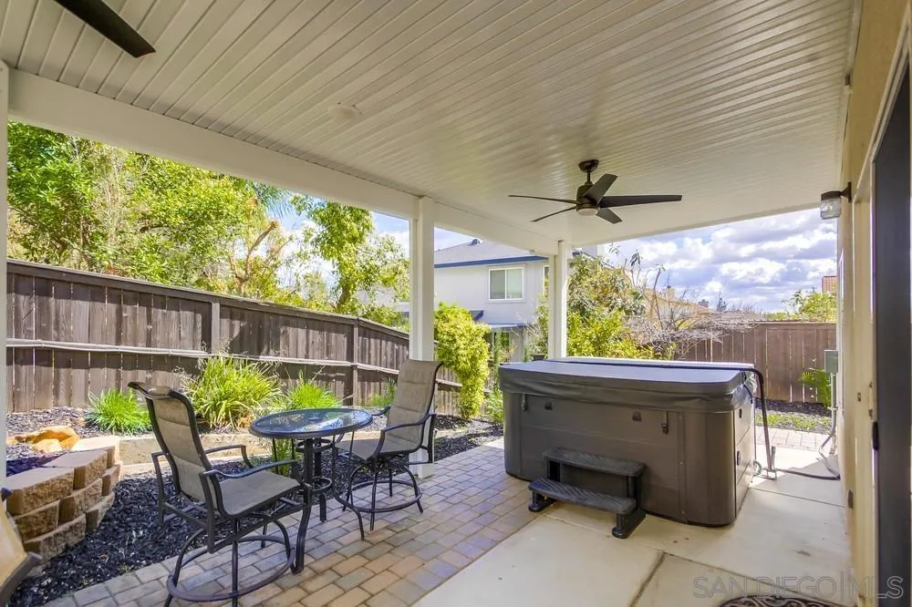 640 Dimaio Way Escondido, CA 92027 - Photo 30 of 31 a patio with table and chairs