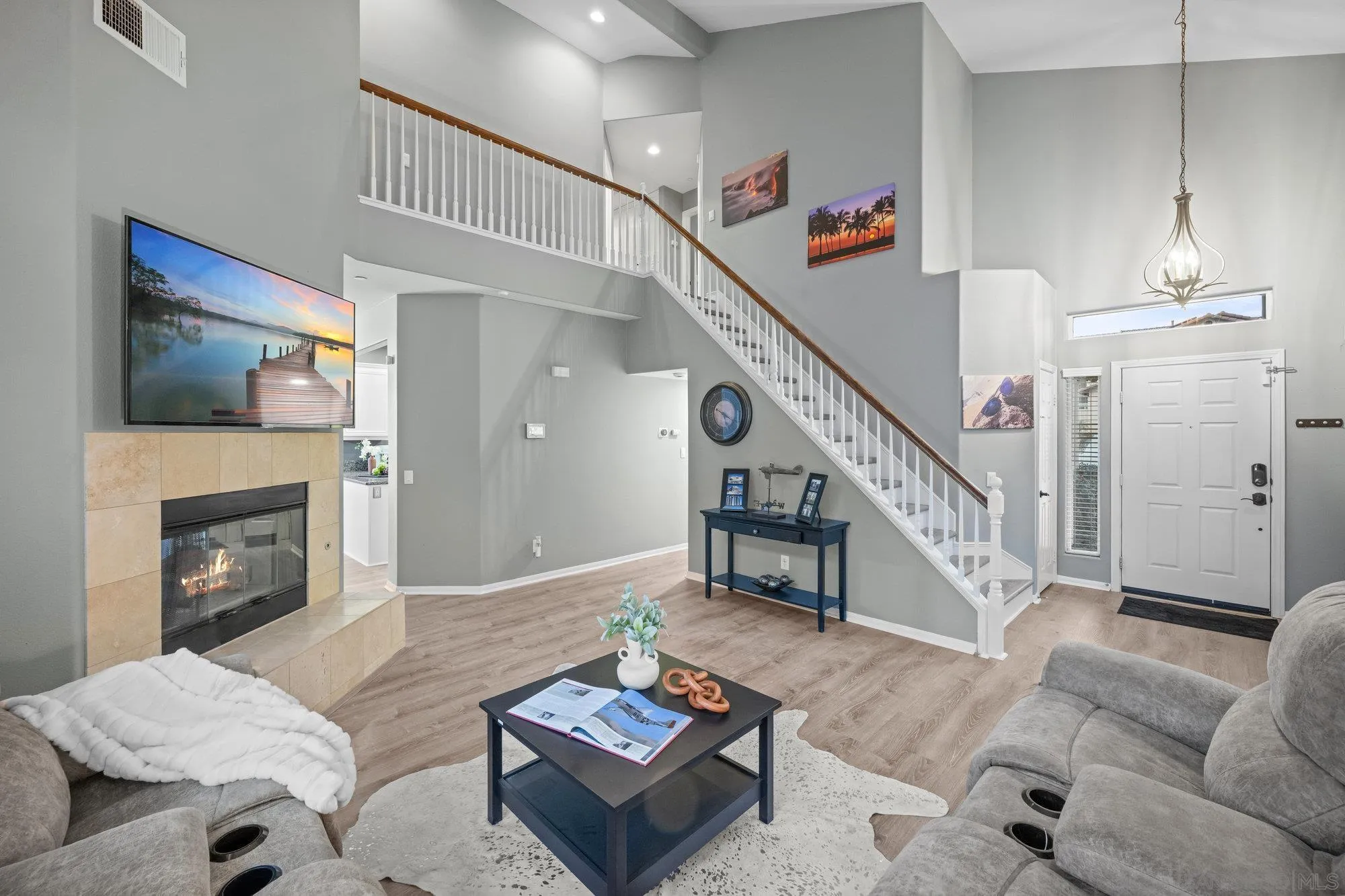 640 Dimaio Way Escondido, CA 92027 - Photo 5 of 31 a living room with furniture and a fireplace