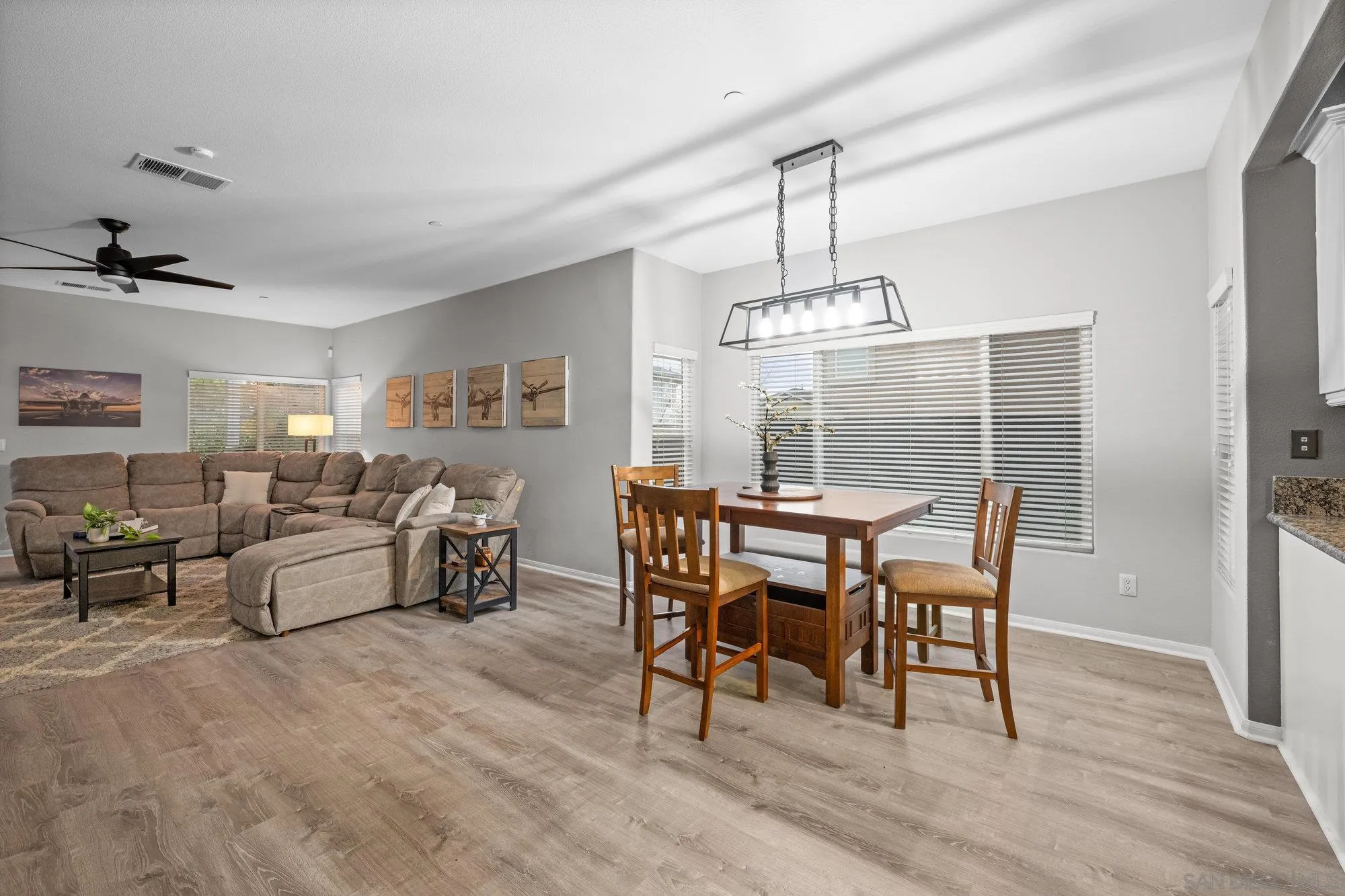 640 Dimaio Way Escondido, CA 92027 - Photo 6 of 31 a view of a dining room with furniture window and wooden floor