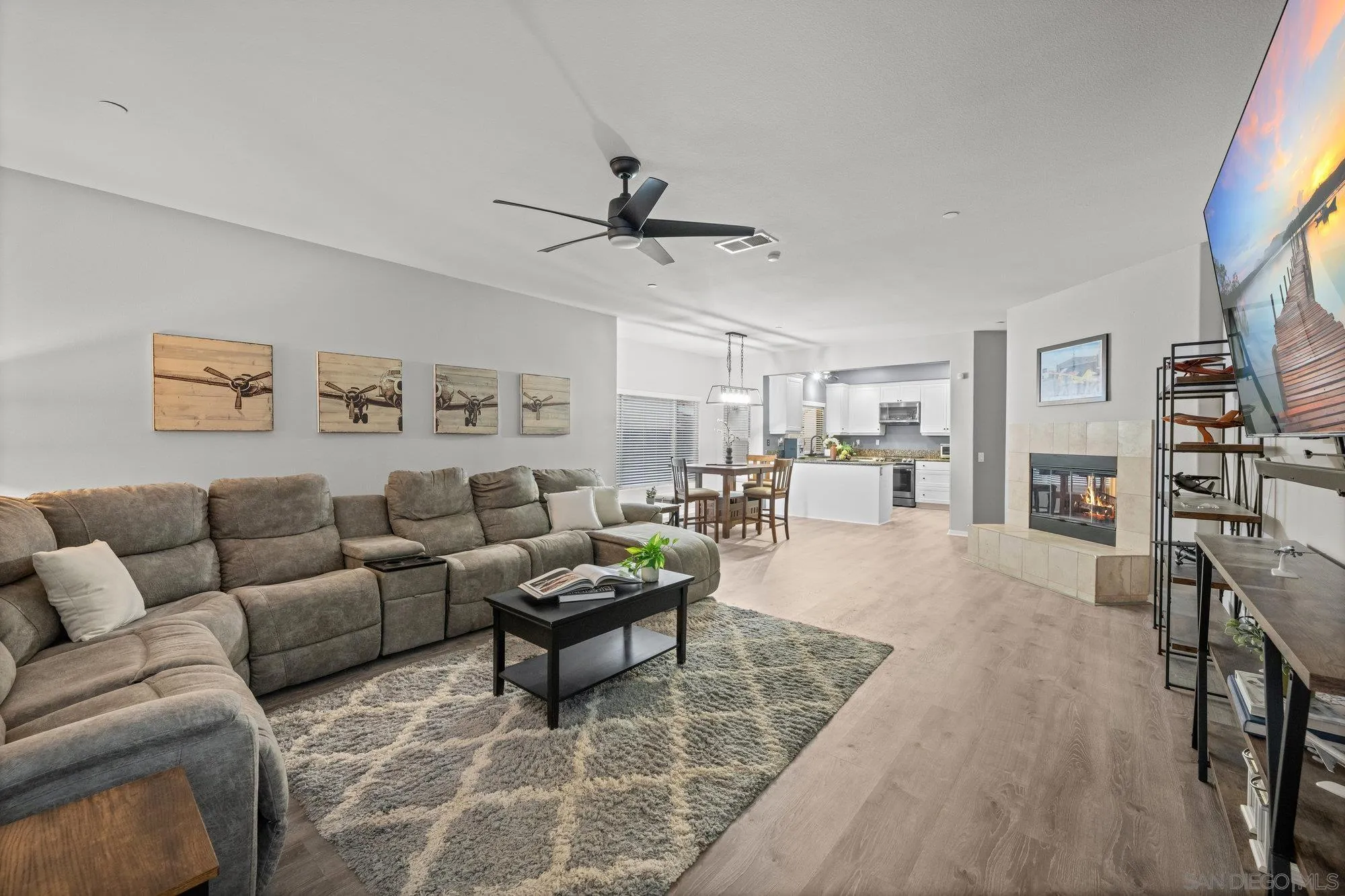 640 Dimaio Way Escondido, CA 92027 - Photo 8 of 31 a living room with furniture and view of kitchen