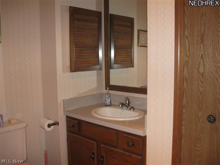 8908 Shepard Road Macedonia, OH 44056 - Photo 16 of 25 Part of master bath which includes linen closet.