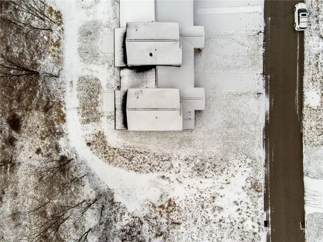 a bathroom with a sink toilet and mirror