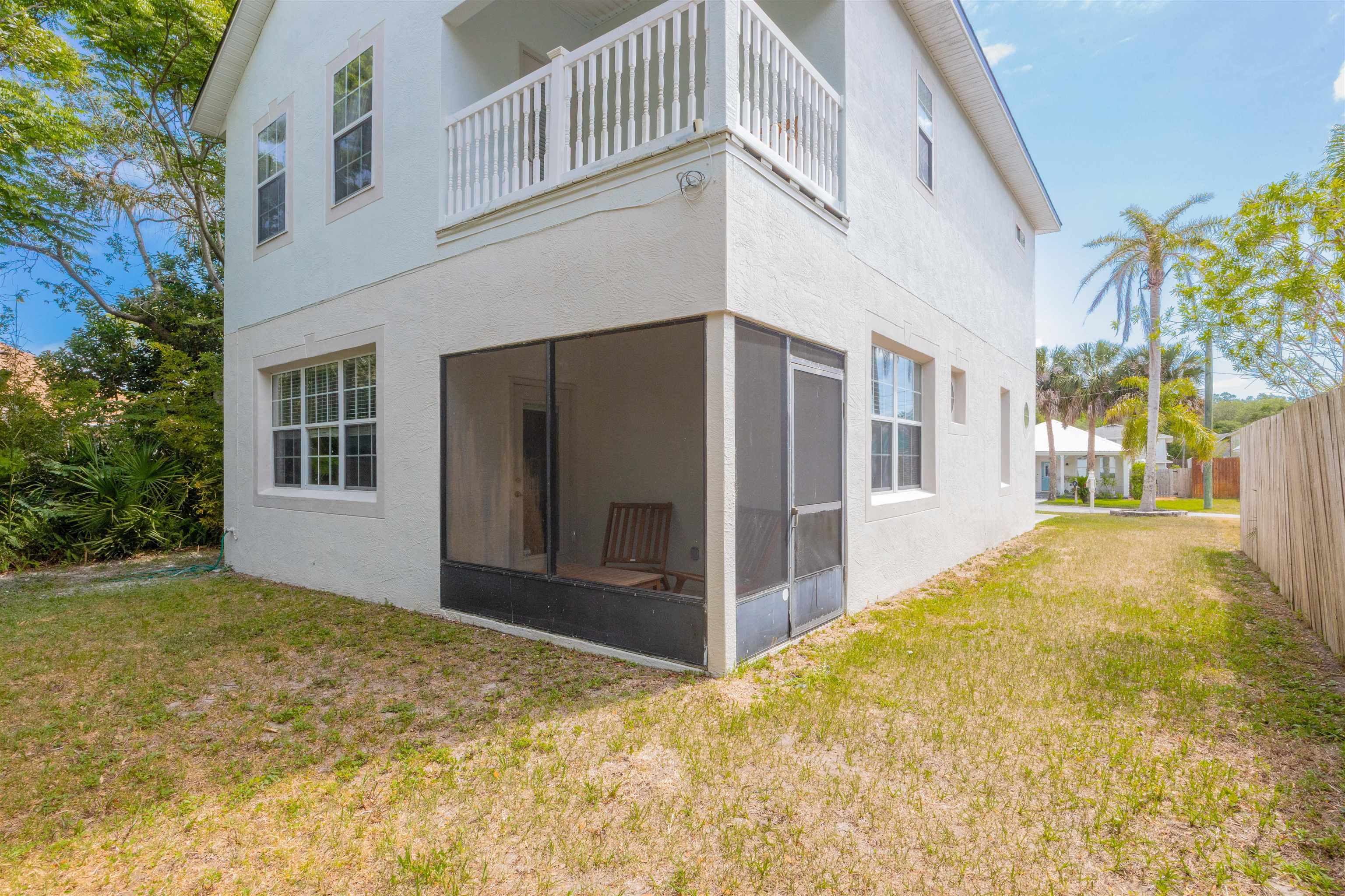 2 Lisbon Street St. Augustine, FL 32080 - Photo 13 of 33 a view of house with yard