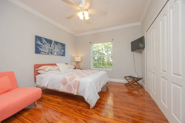 a bedroom with bed and window