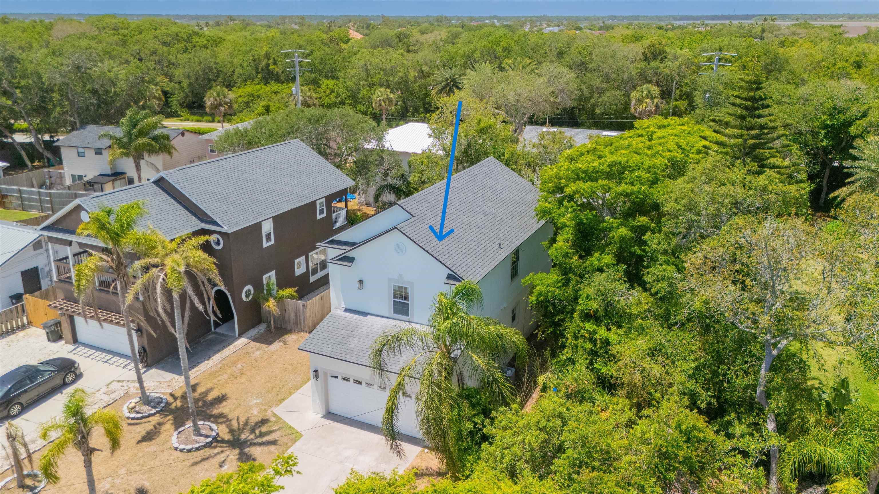 2 Lisbon Street St. Augustine, FL 32080 - Photo 32 of 33 an aerial view of a house with a yard and lake view