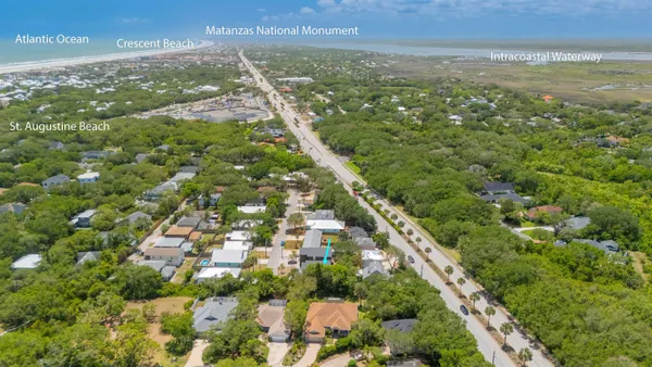 a view of city with ocean