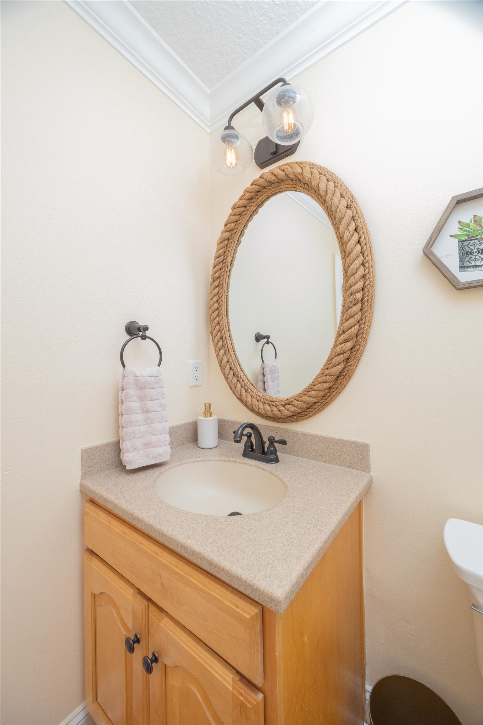 2 Lisbon Street St. Augustine, FL 32080 - Photo 5 of 33 a bathroom with a sink a mirror and a toilet