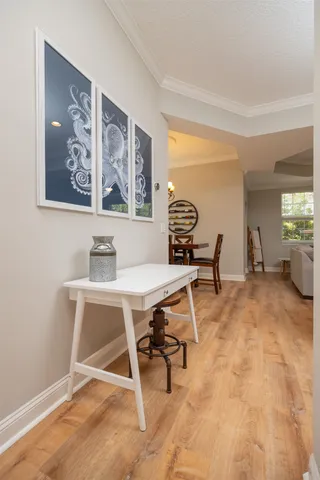 a view of a workspace with furniture