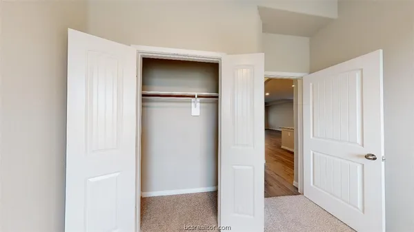 a bathroom with a double vanity sink
