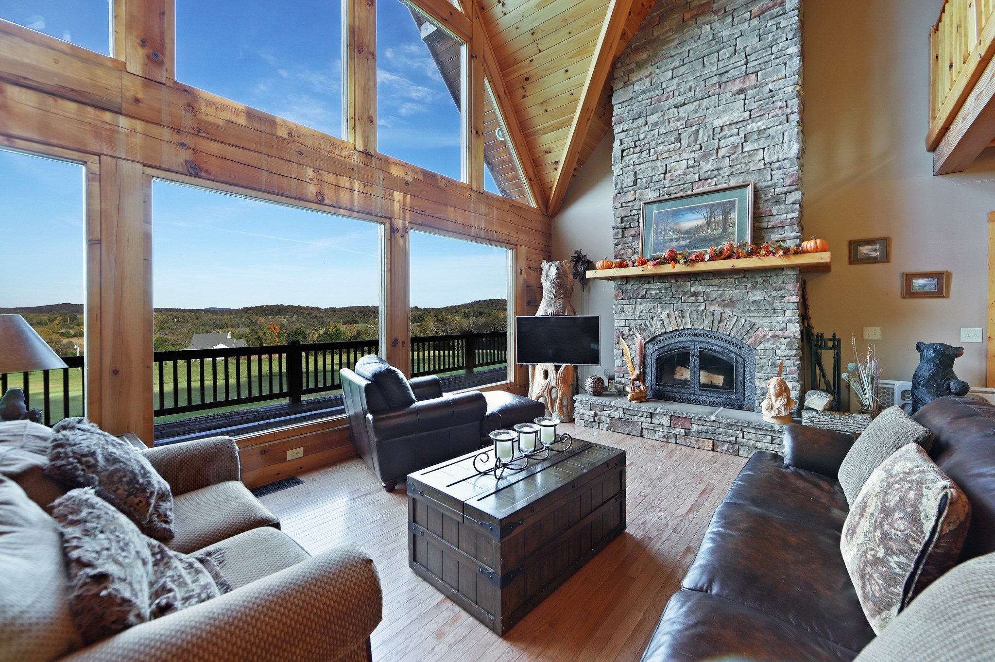 3686 Bluebird Road Lebanon, TN 37090 - Photo 11 of 50 a living room with furniture a fireplace and a large window