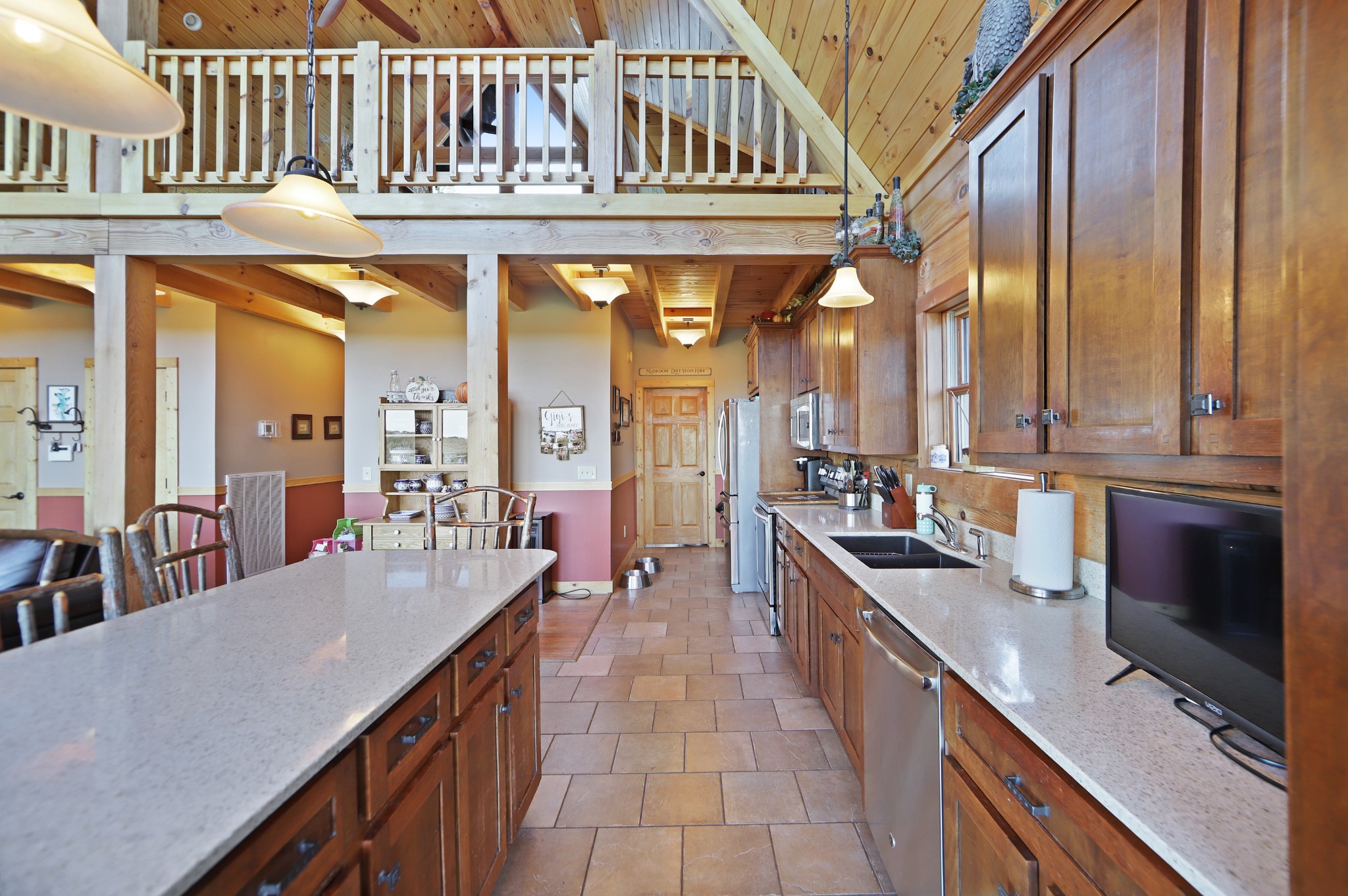 3686 Bluebird Road Lebanon, TN 37090 - Photo 19 of 50 a large kitchen with stainless steel appliances kitchen island granite countertop a large counter top and cabinets