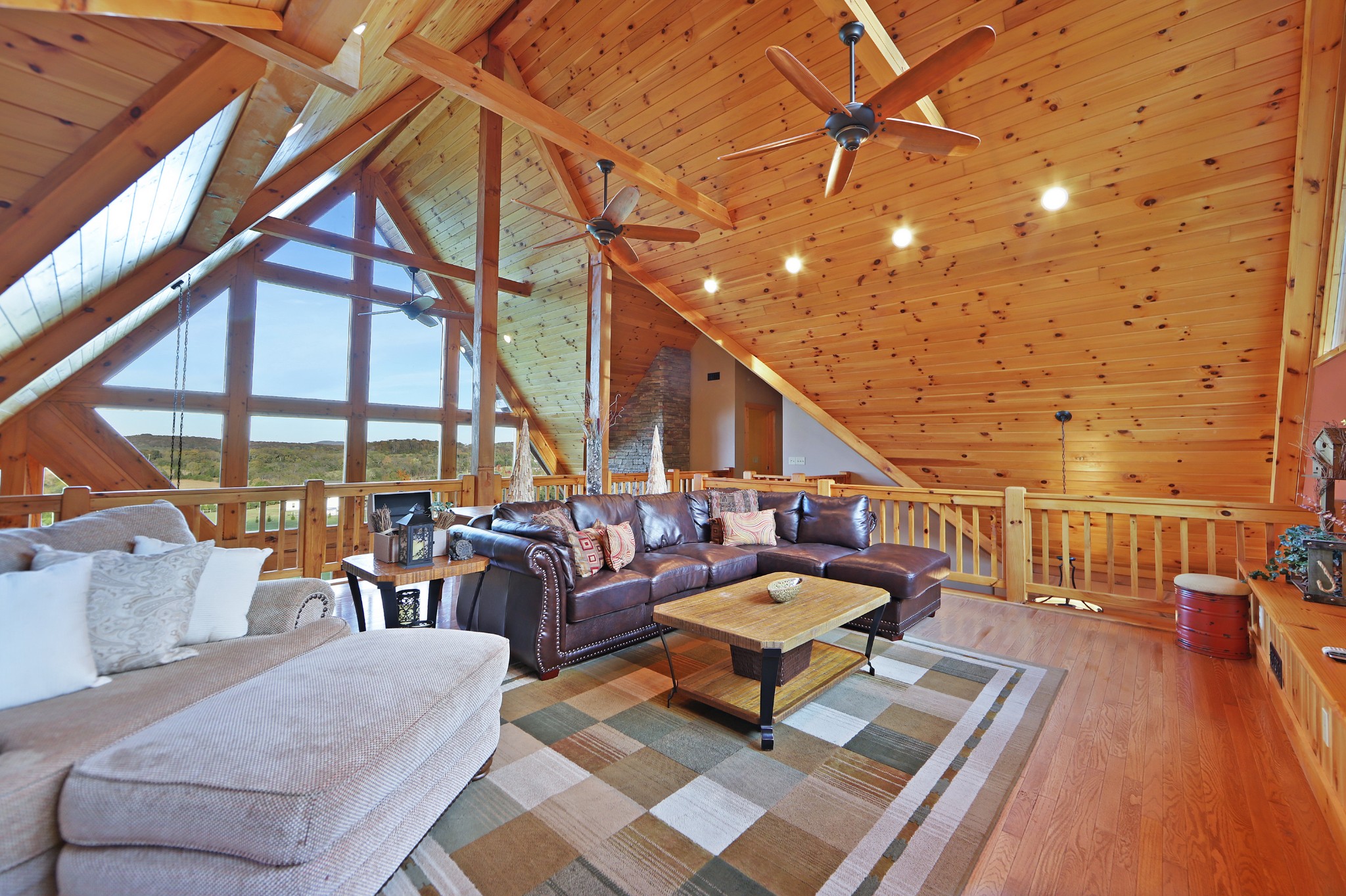 3686 Bluebird Road Lebanon, TN 37090 - Photo 30 of 50 a living room with patio furniture and a wooden floor