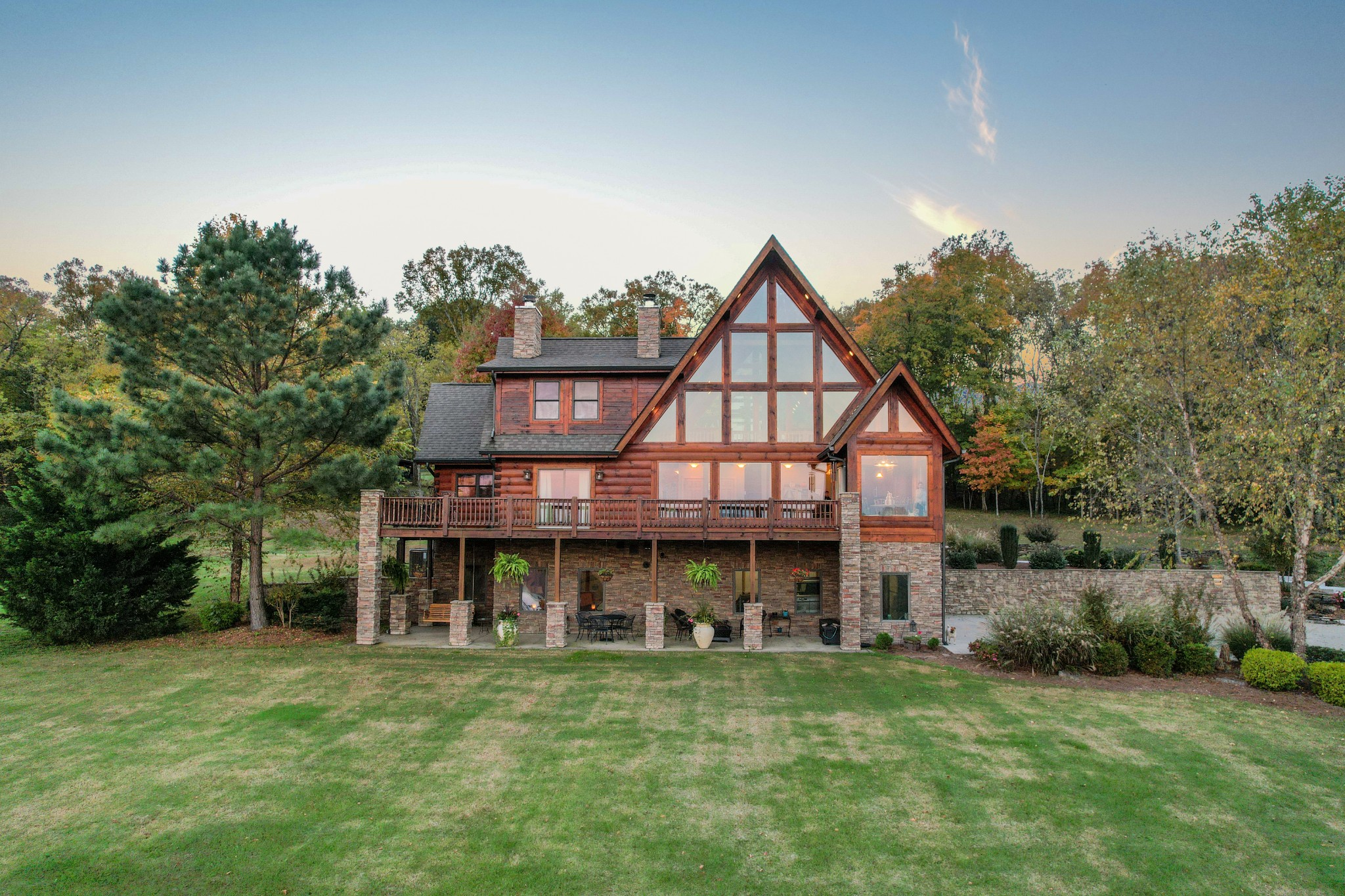 3686 Bluebird Road Lebanon, TN 37090 - Photo 6 of 50 a view of a big house with a big yard and large trees