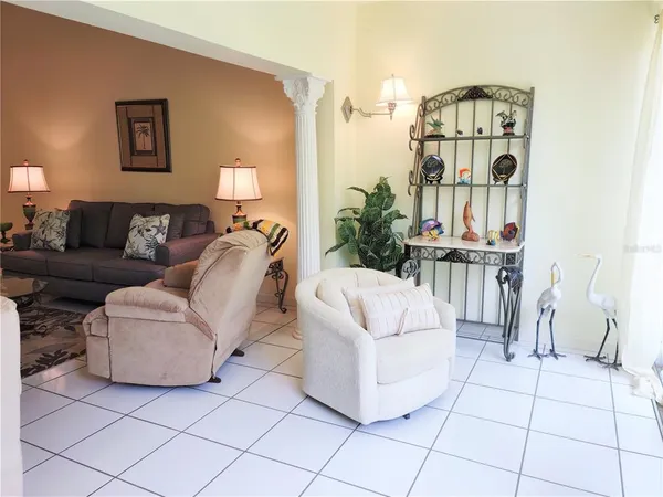 a living room with furniture and a table