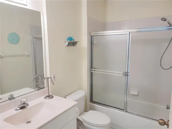 a view of a swimming pool and deck