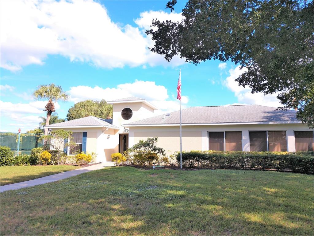 Undisclosed Address Venice, FL 34292 - Photo 44 of 51 a front view of a house with garden