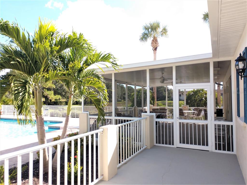 Undisclosed Address Venice, FL 34292 - Photo 49 of 51 a view of a house with porch and wooden floor