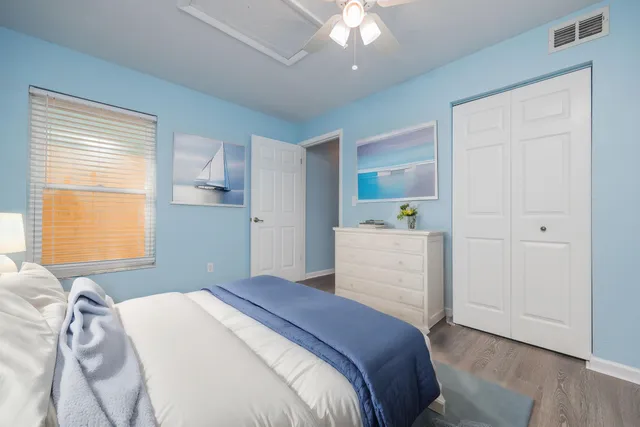 a bathroom with a sink mirror toilet and bathtub