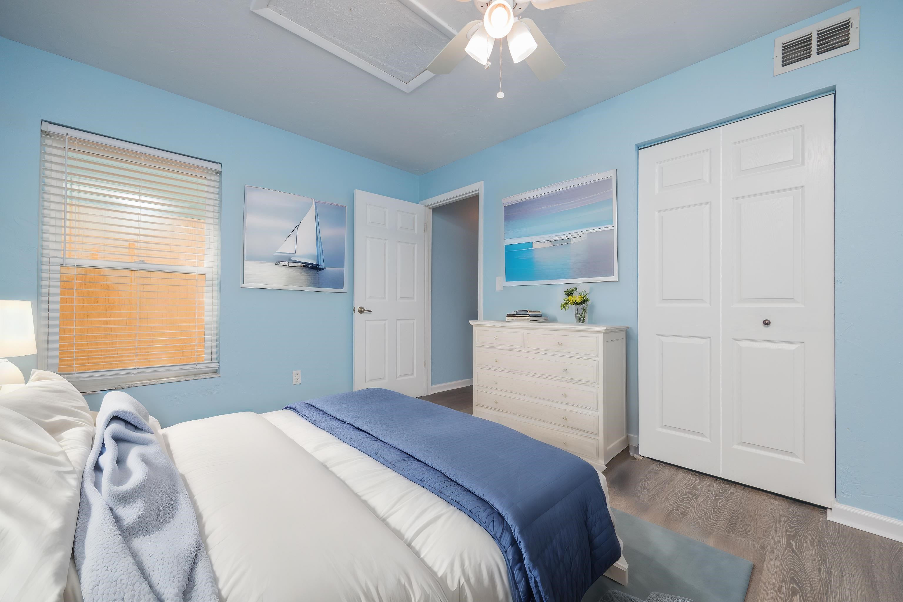 4703 Sandcastle Circle St. Augustine, FL 32084 - Photo 6 of 14 a bedroom with a bed and a window