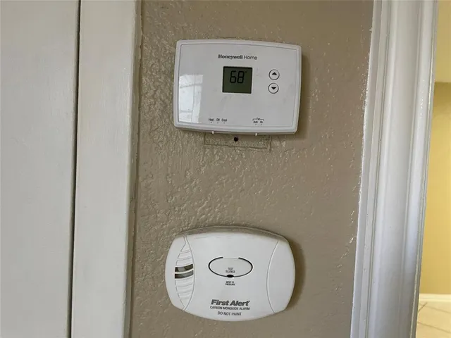 a kitchen with a sink a counter and cabinets