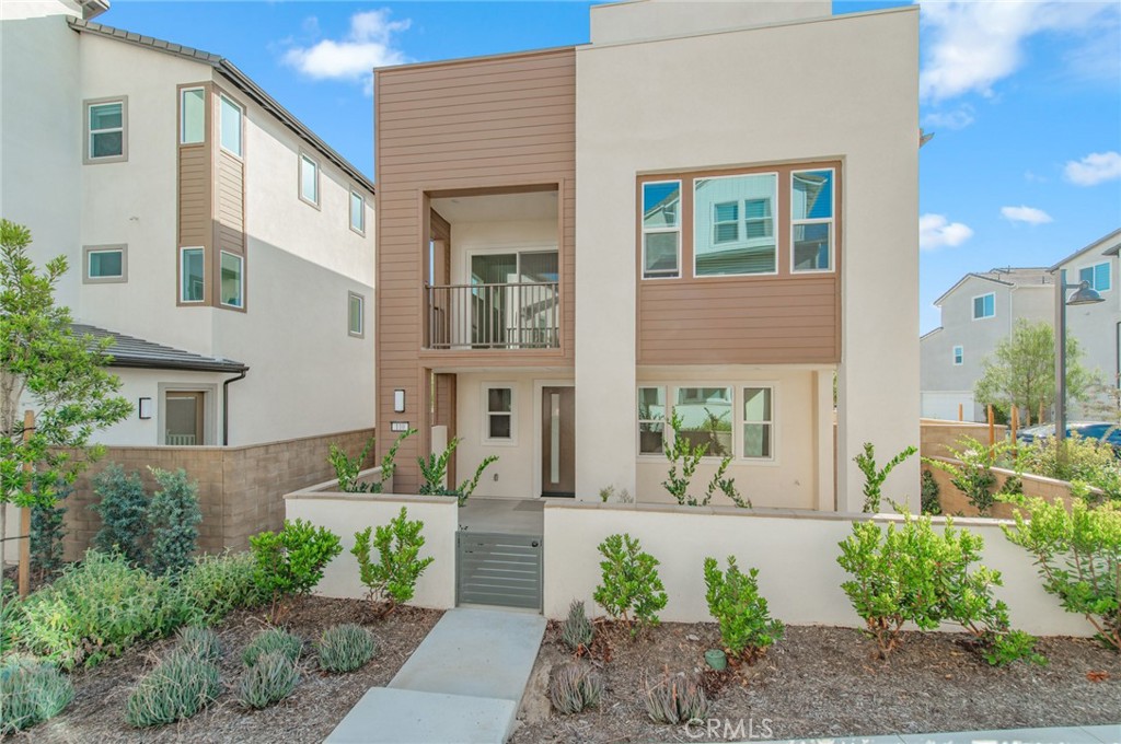 110 Seep Irvine, CA 92618 - Photo 2 of 37 a front view of a house with garden